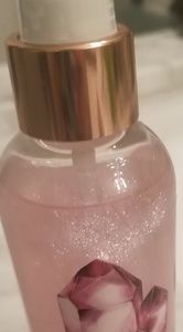 Rose quartz shimmer body spray.